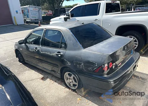 2002 Mitsubishi Lancer Oz Rally from USA, damaged, VIN JA3AJ86E82U020199